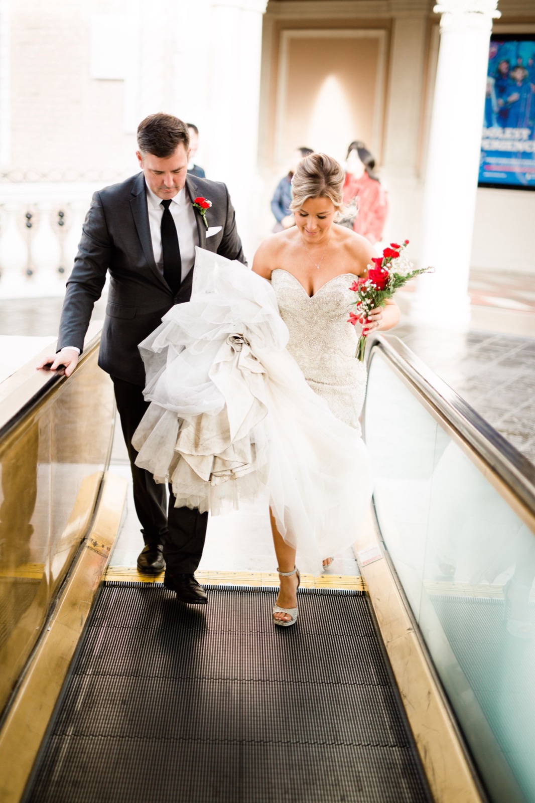 Groom helping bride