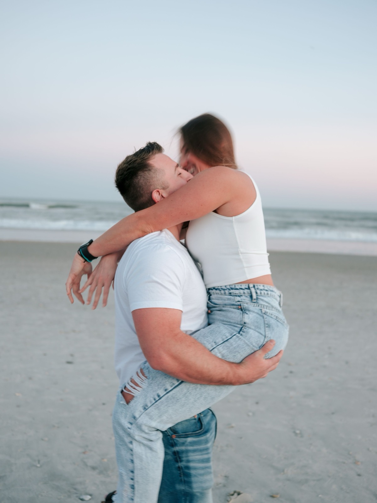 guy holding her up
