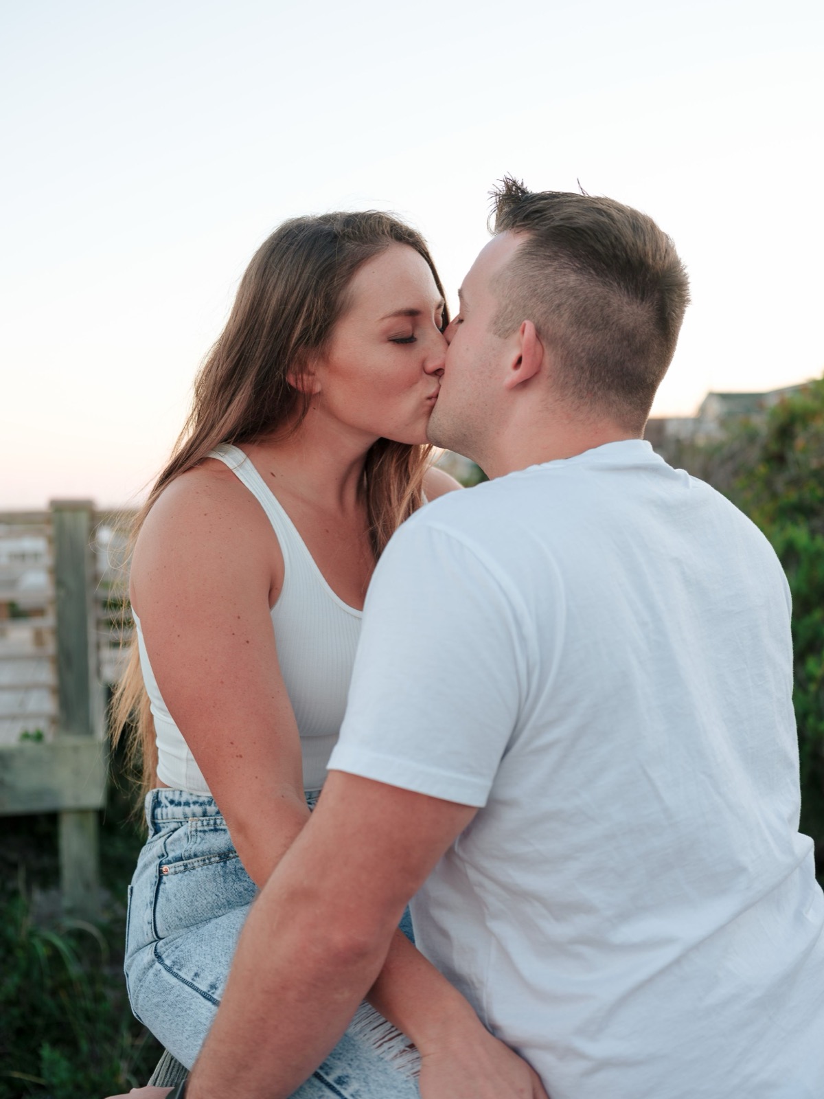 kissing while shes on the ledge