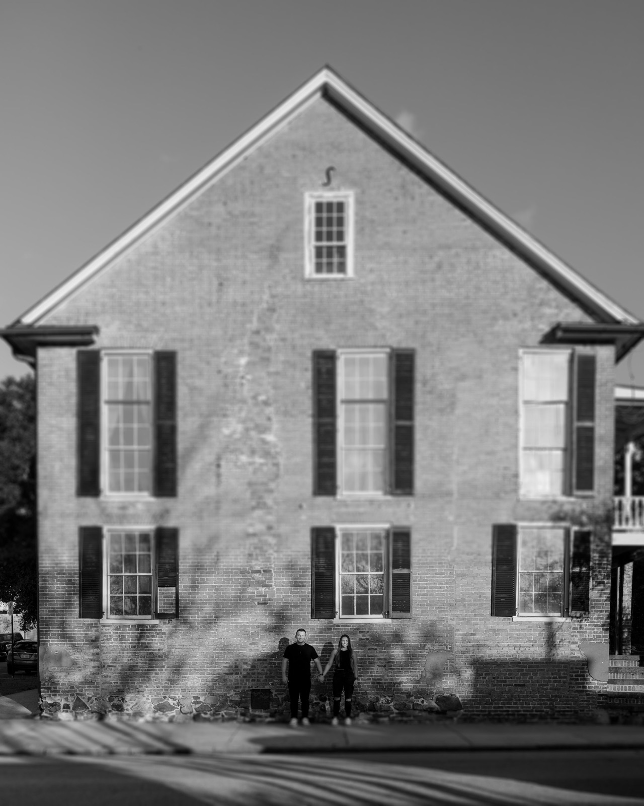 red brick wall in black and white