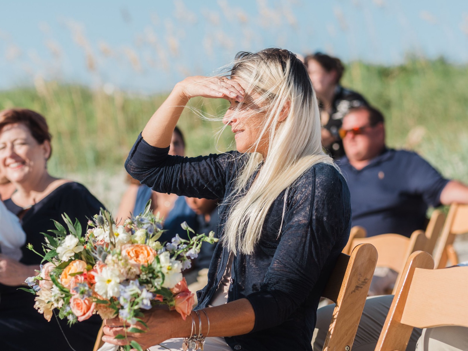 Beach Wedding In Oak Island + Beach House and Reception Photos — photograph 13