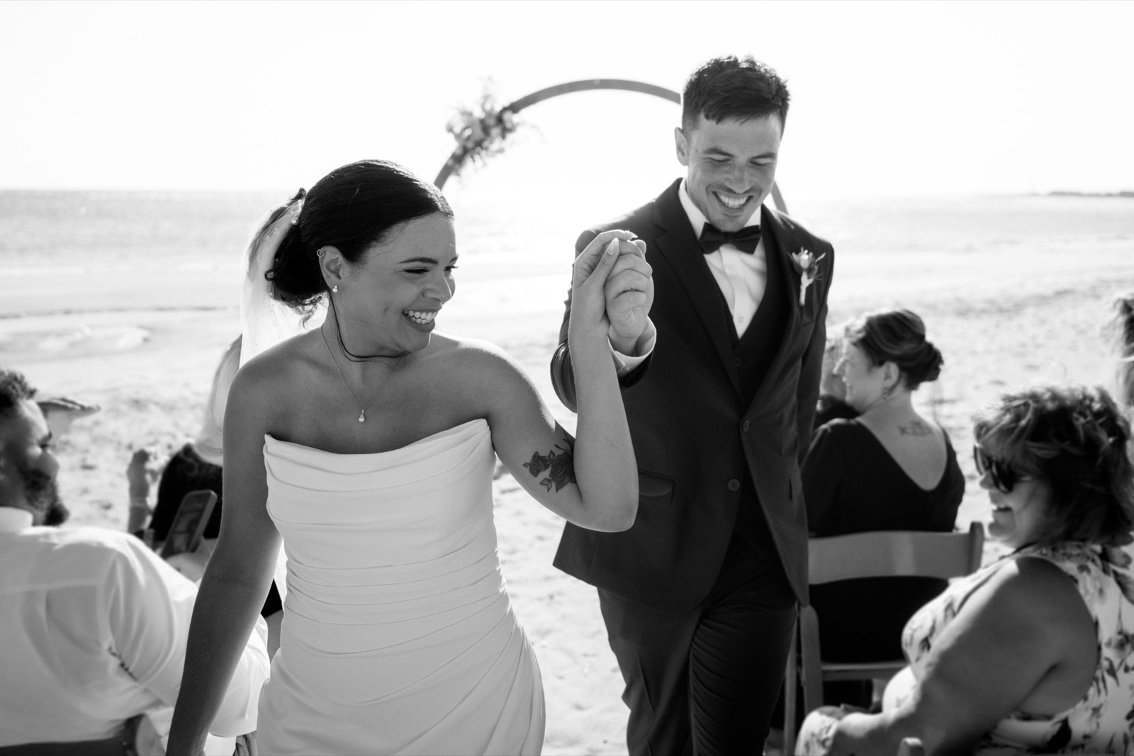 Beach Wedding In Oak Island + Beach House and Reception Photos — photograph 15