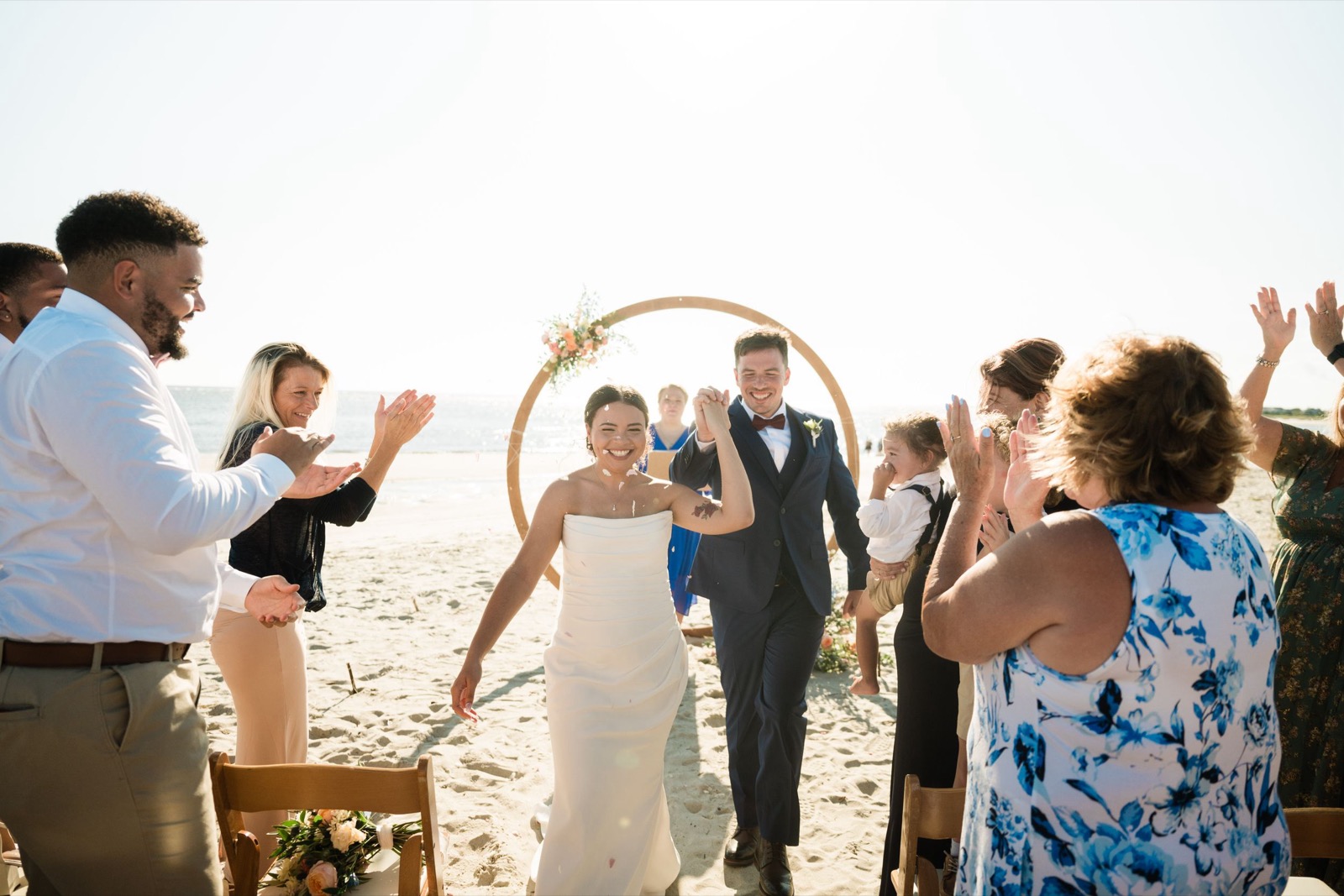 Beach Wedding In Oak Island + Beach House and Reception Photos — photograph 16