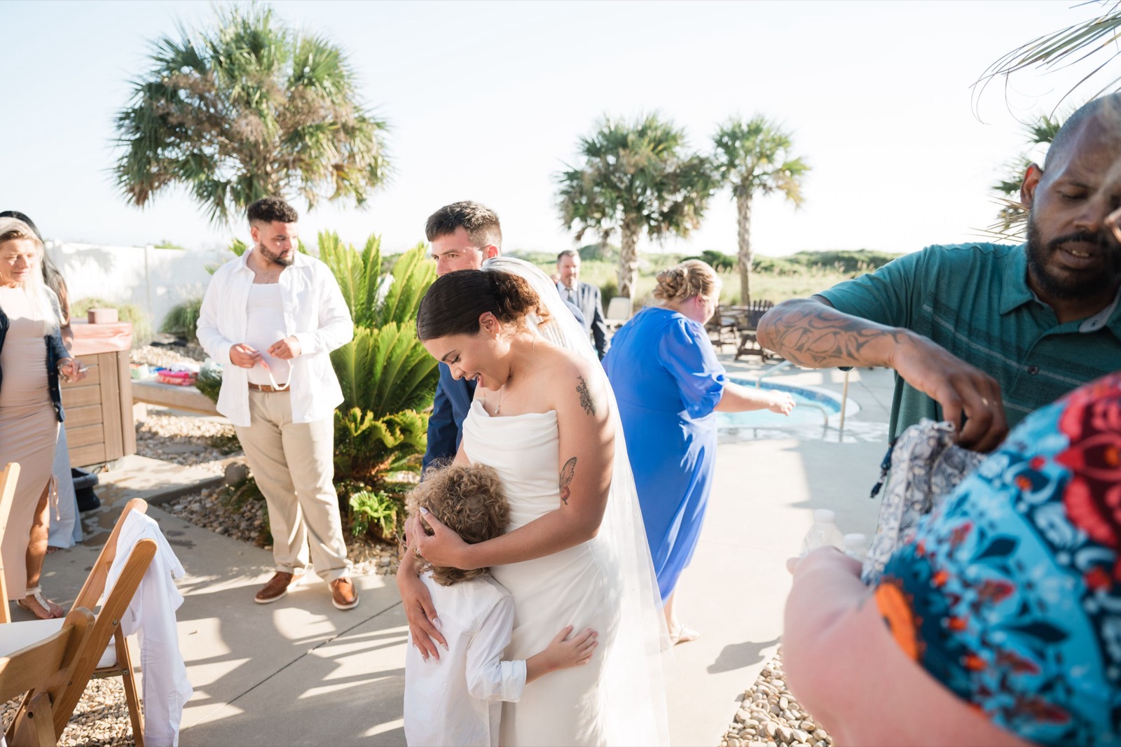 Beach Wedding In Oak Island + Beach House and Reception Photos — photograph 18