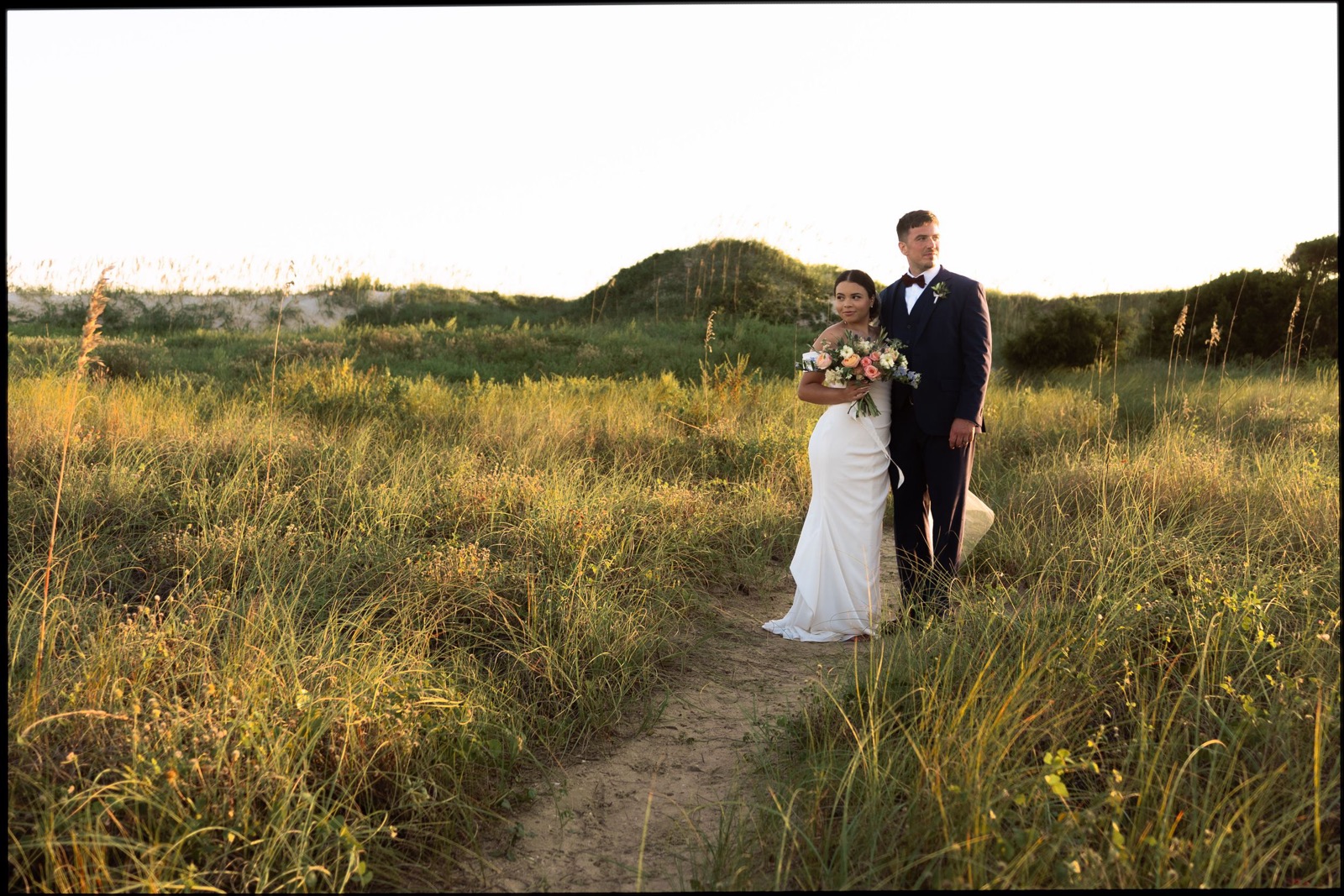 Beach Wedding In Oak Island + Beach House and Reception Photos — photograph 26