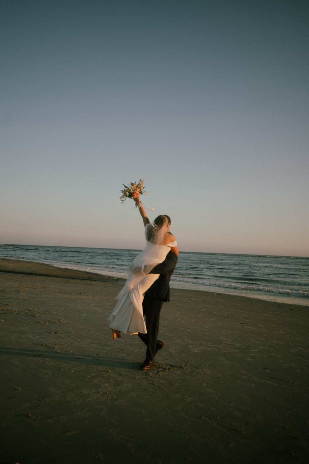Beach Wedding In Oak Island + Beach House and Reception Photos — photograph 28