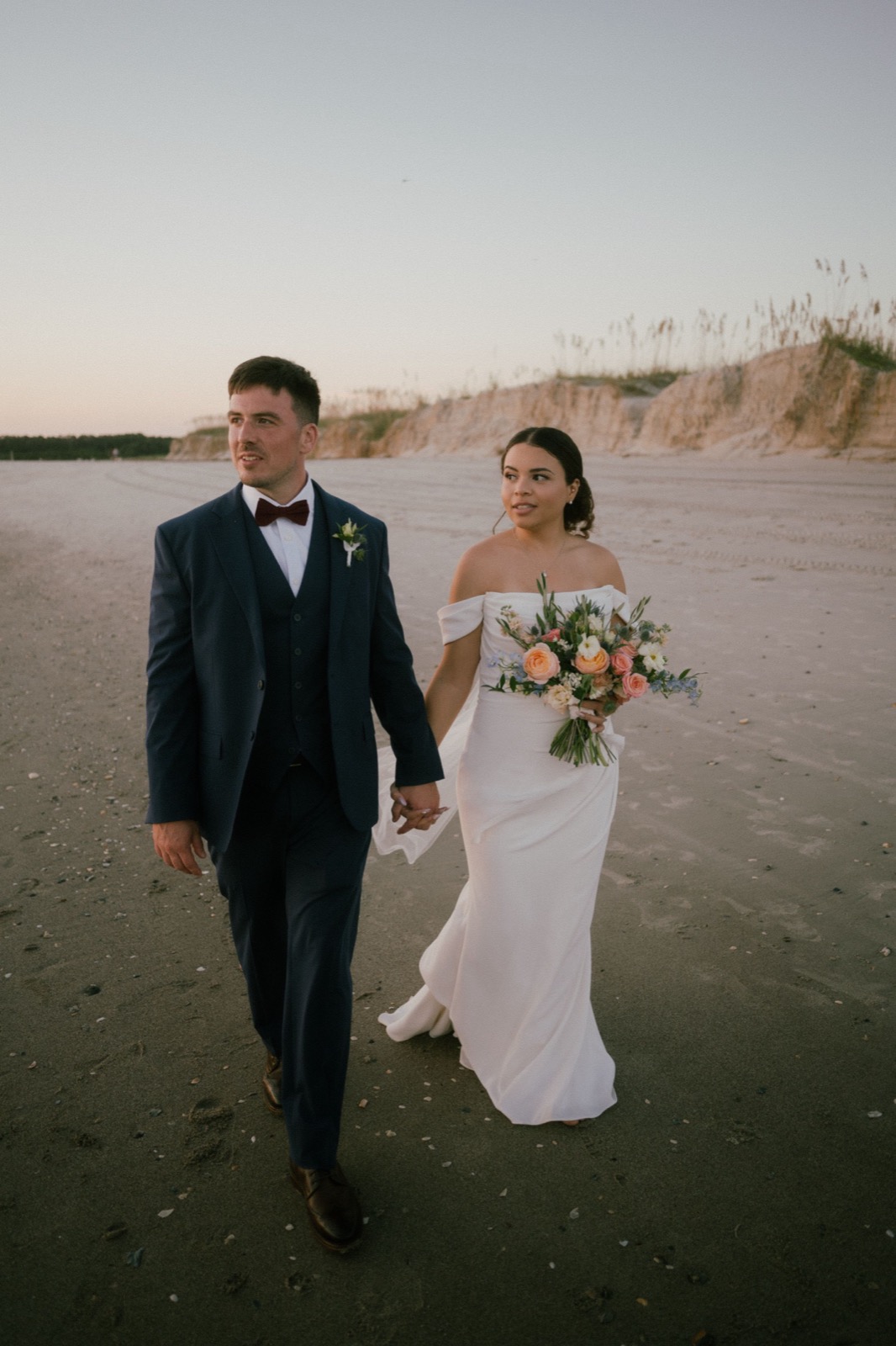 Beach Wedding In Oak Island + Beach House and Reception Photos — photograph 31