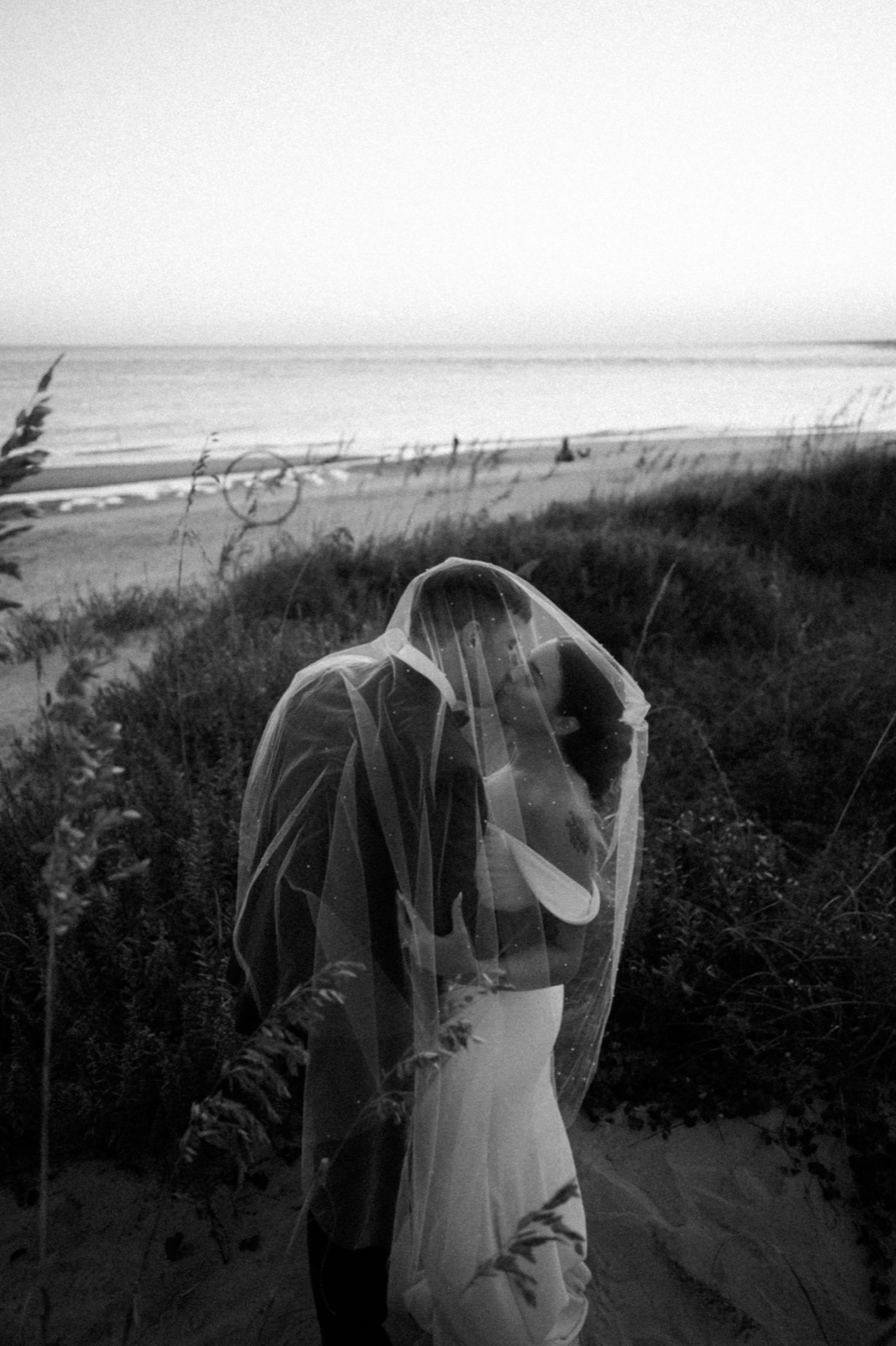 Beach Wedding In Oak Island + Beach House and Reception Photos — photograph 34
