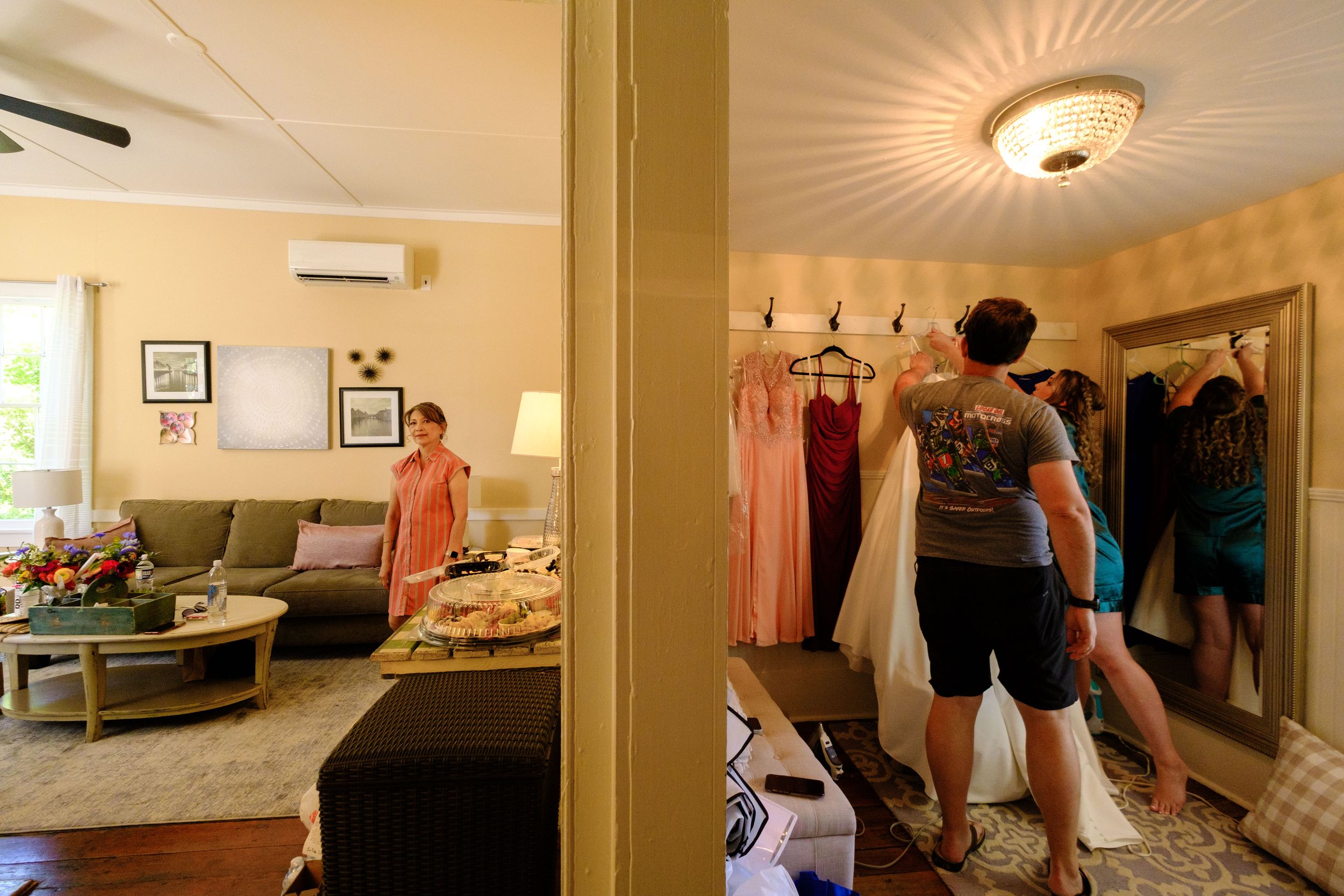 Sequence of panoramic interior shots showing a beige-toned bedroom with mounted television and modern furnishings.