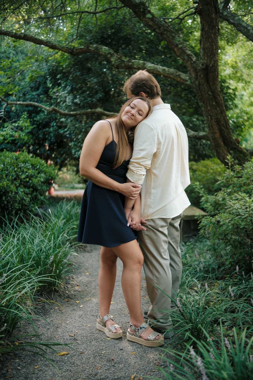 photographer captures couples getting engaged in New Hanover Arboretum | North Carolina wedding photographer