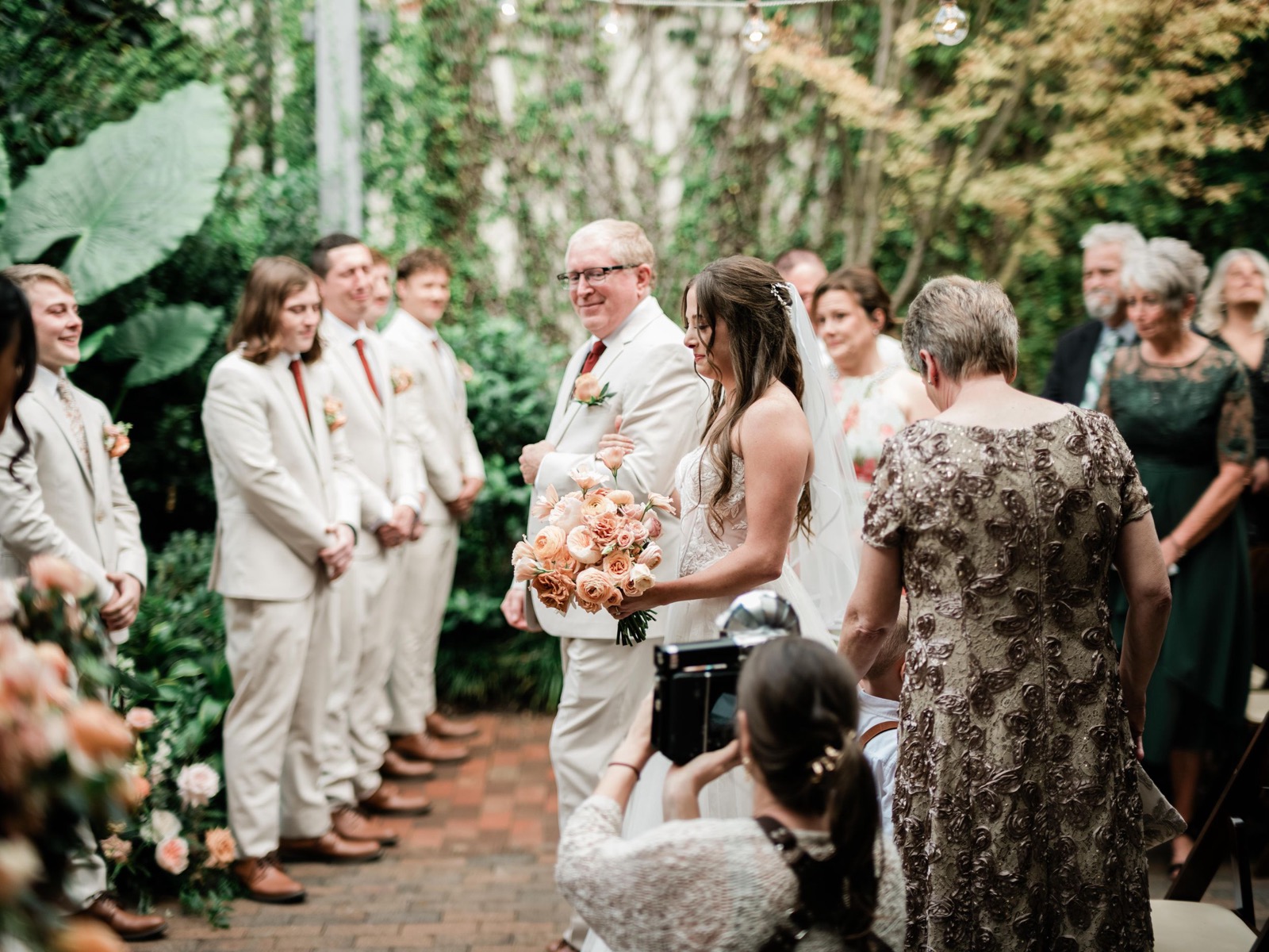 couples getting married at an outdoor wedding venue at the Atrium in Wilmington, NC