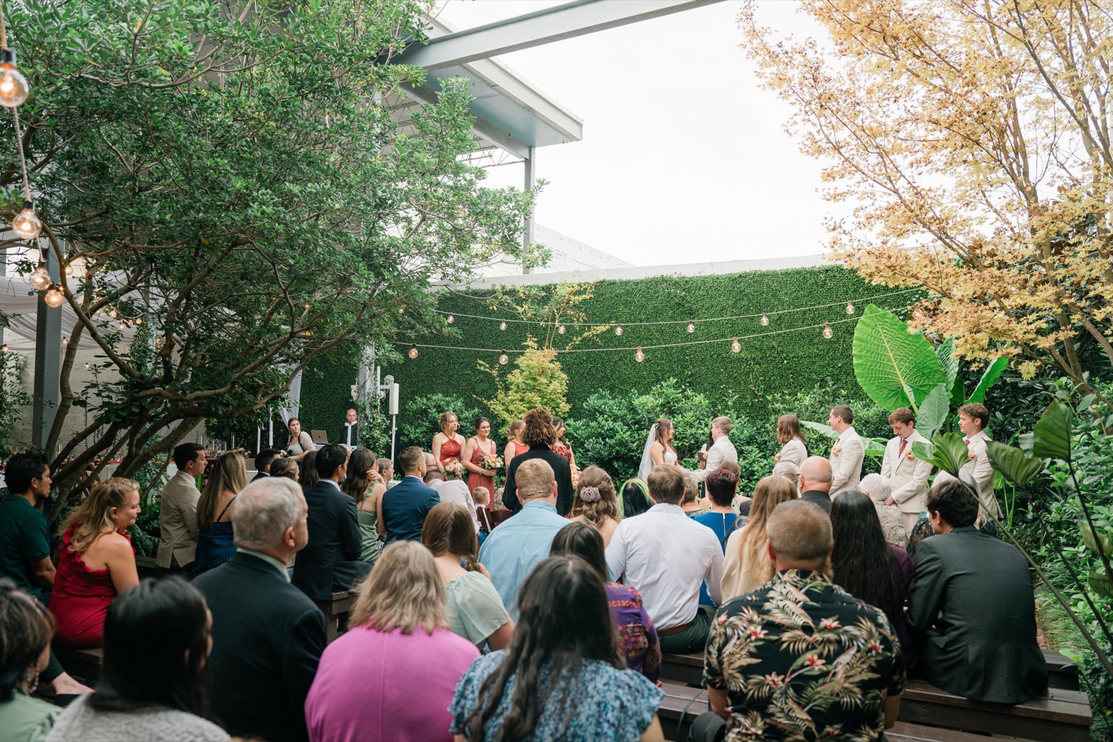 couples getting married at an outdoor wedding venue at the Atrium in Wilmington, NC