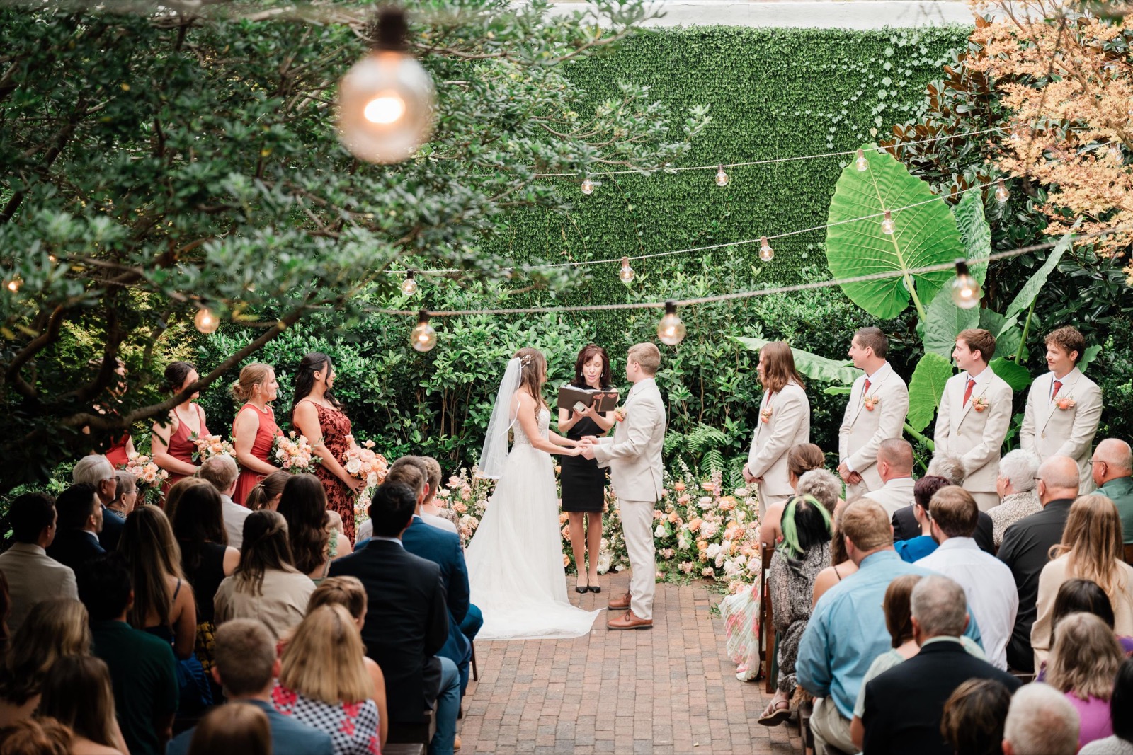couples getting married at an outdoor wedding venue at the Atrium in Wilmington, NC