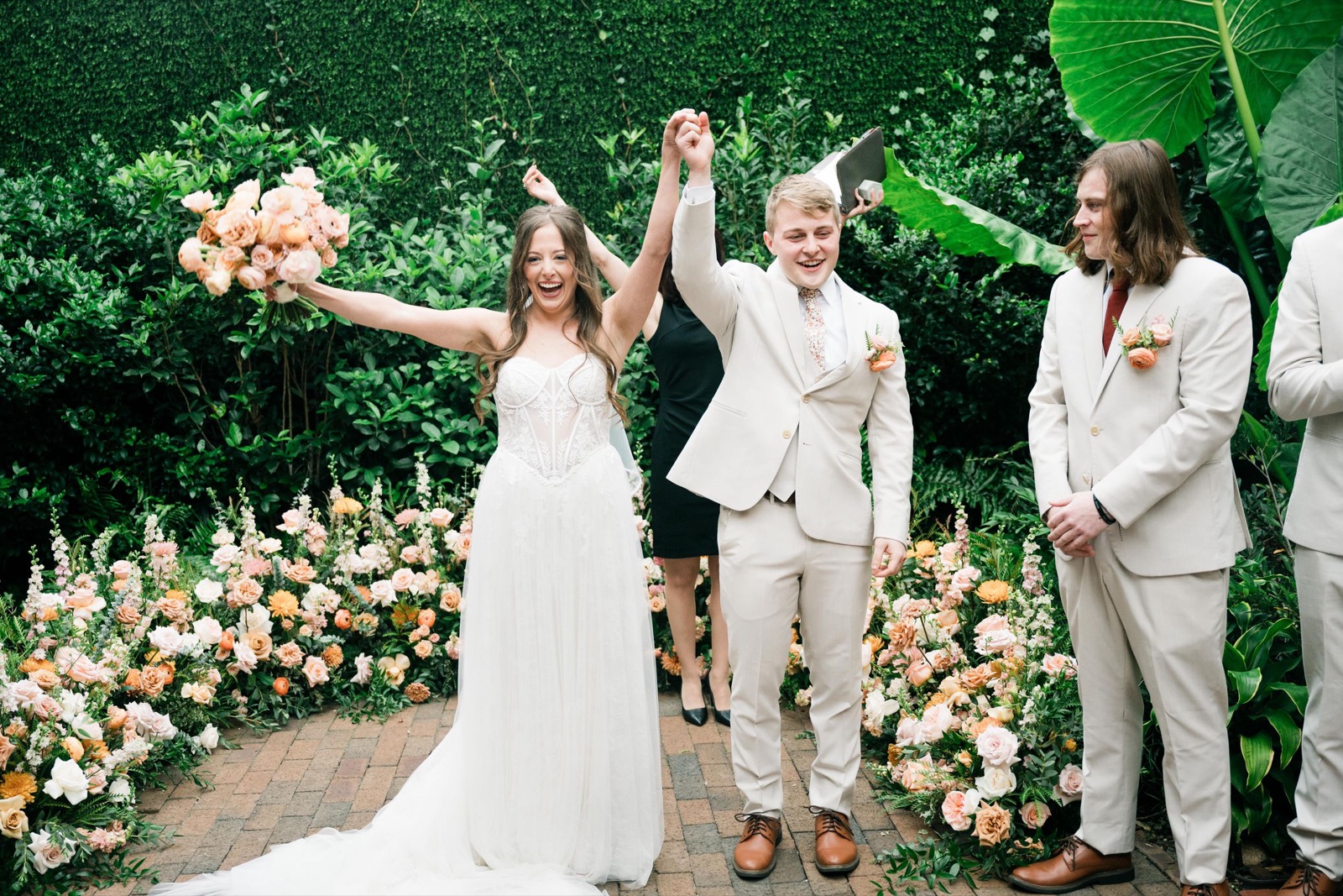 couples getting married at an outdoor wedding venue at the Atrium in Wilmington, NC