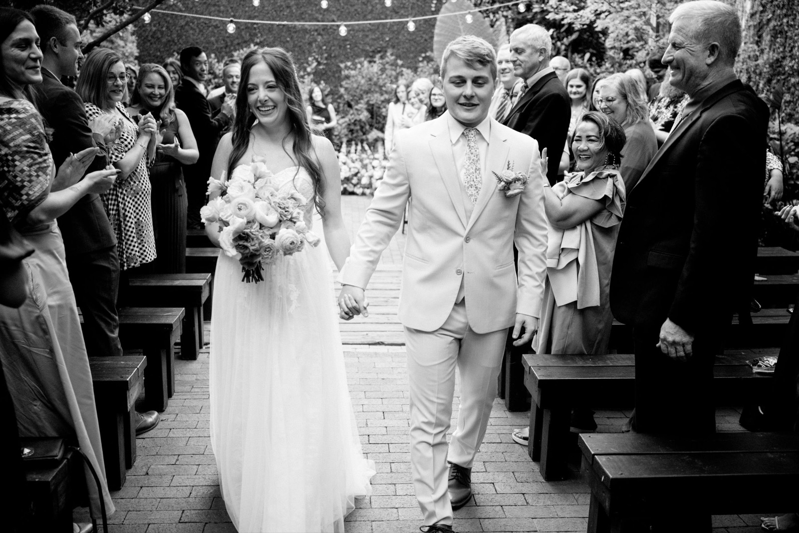 couples getting married at an outdoor wedding venue at the Atrium in Wilmington, NC