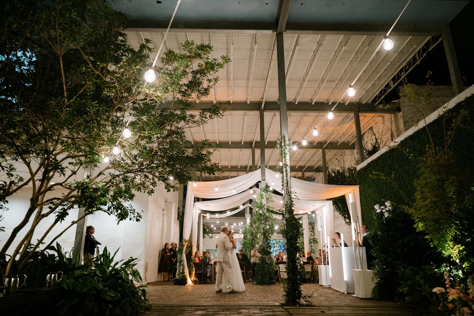 couples getting married at an outdoor wedding venue at the Atrium in Wilmington, NC