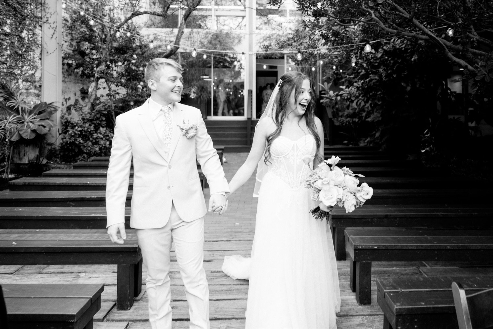 couples getting married at an outdoor wedding venue at the Atrium in Wilmington, NC