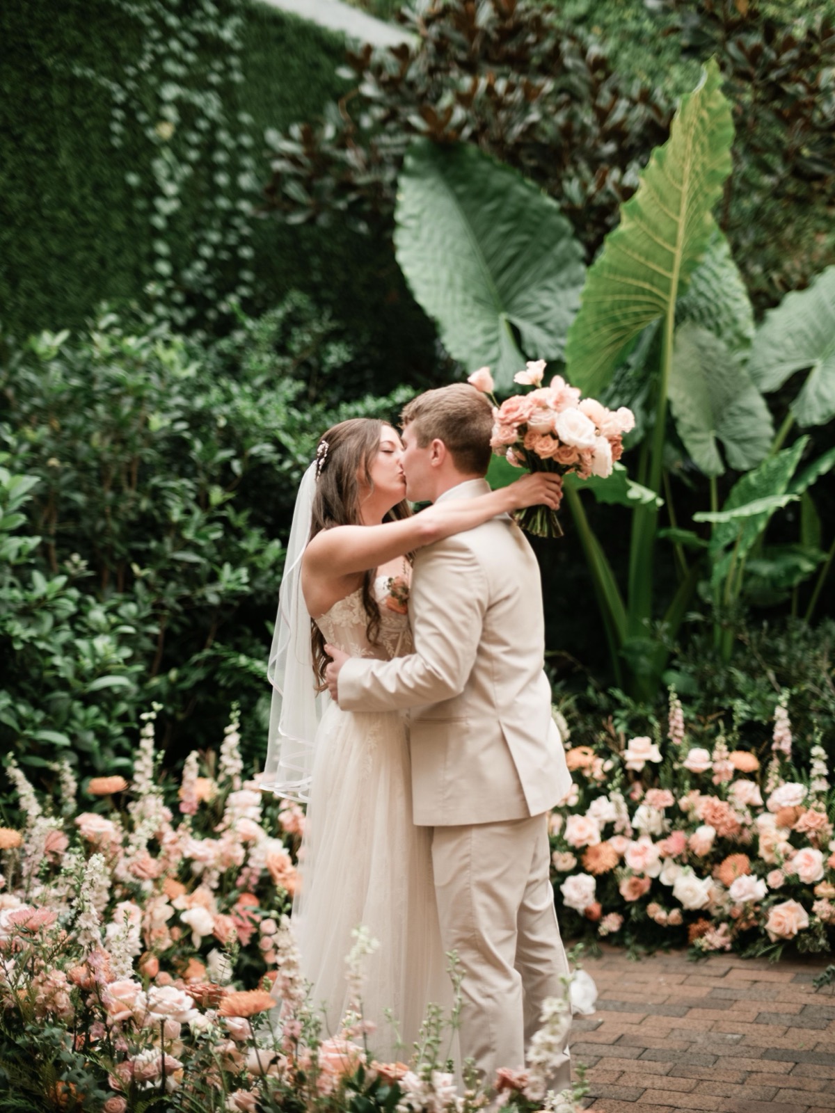 couples getting married at an outdoor wedding venue at the Atrium in Wilmington, NC