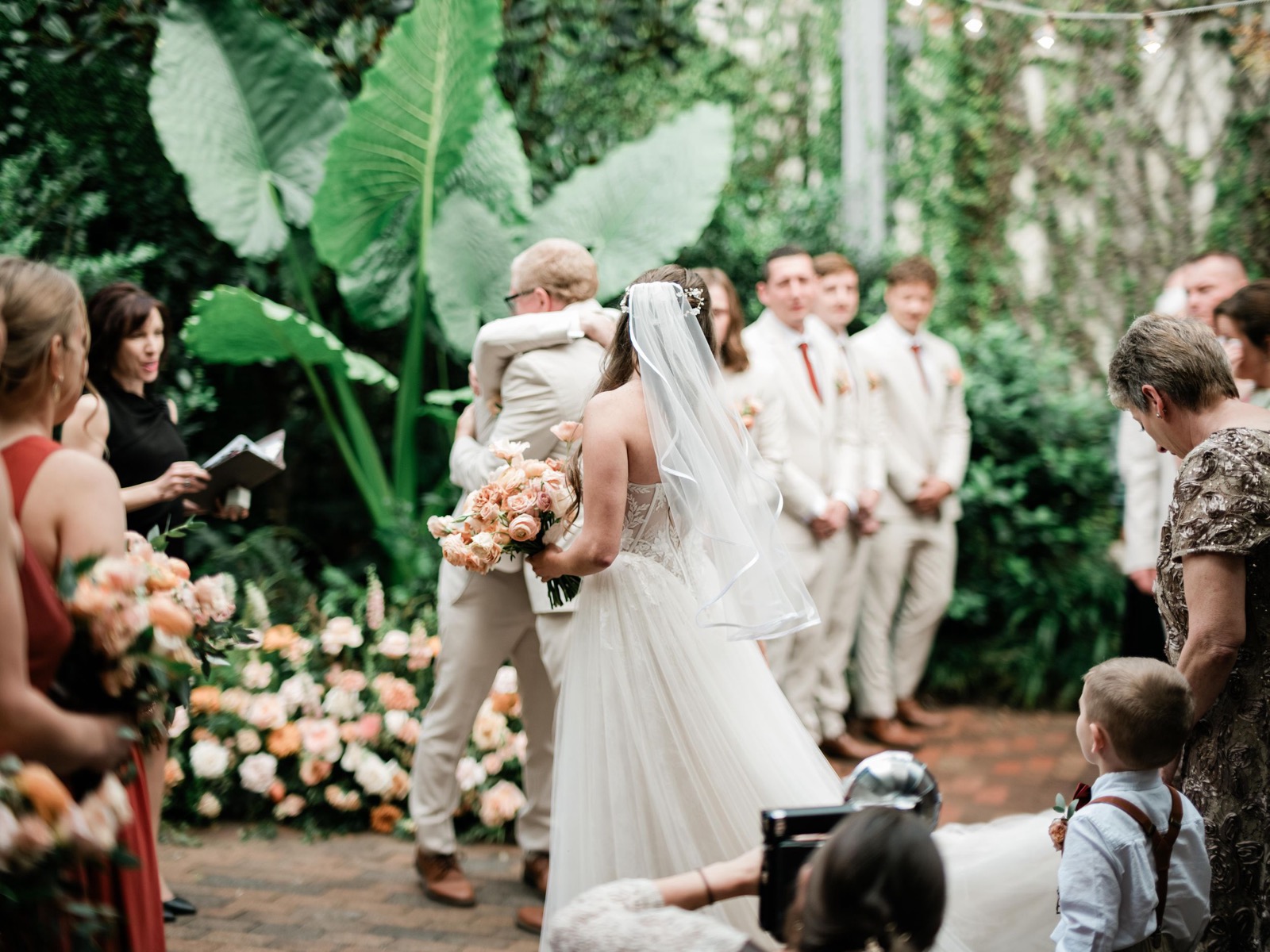 couples getting married at an outdoor wedding venue at the Atrium in Wilmington, NC