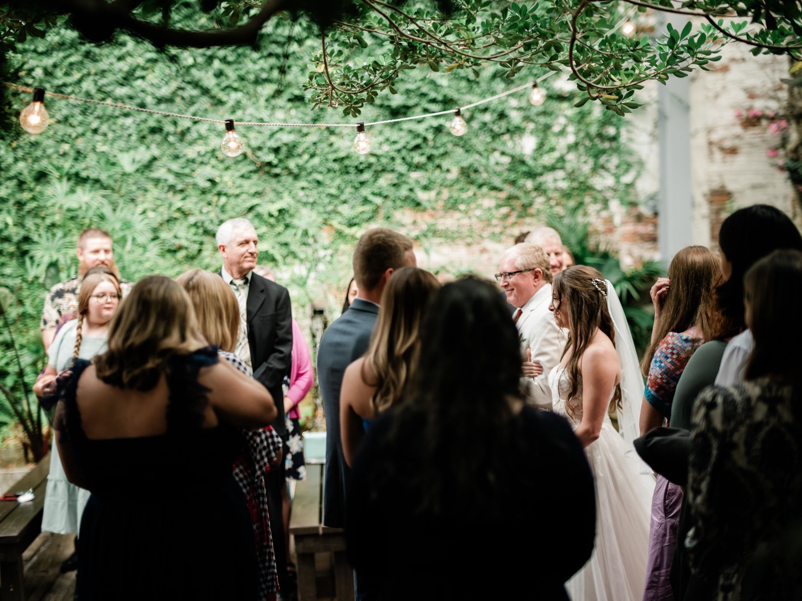 couples getting married at an outdoor wedding venue at the Atrium in Wilmington, NC