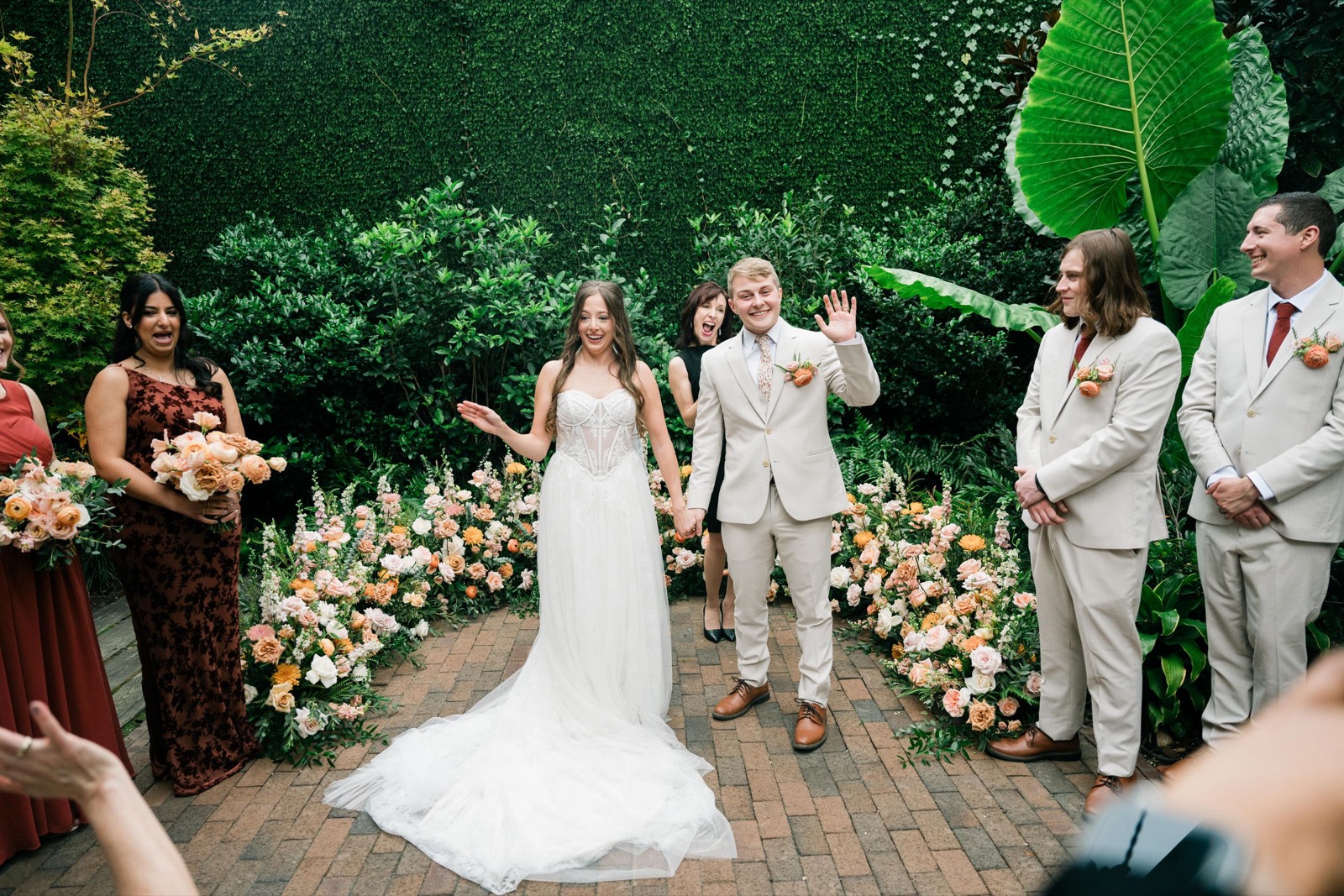 couples getting married at an outdoor wedding venue at the Atrium in Wilmington, NC