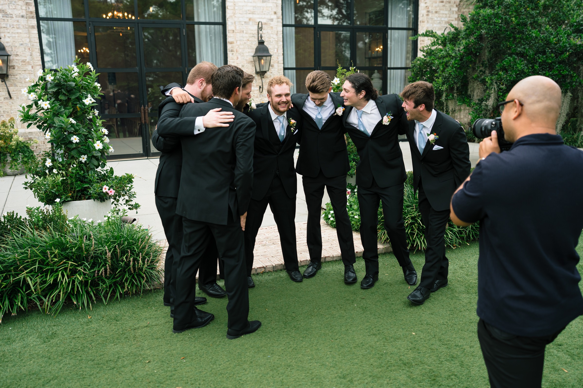 Glenn photographing a wedding party outdoors