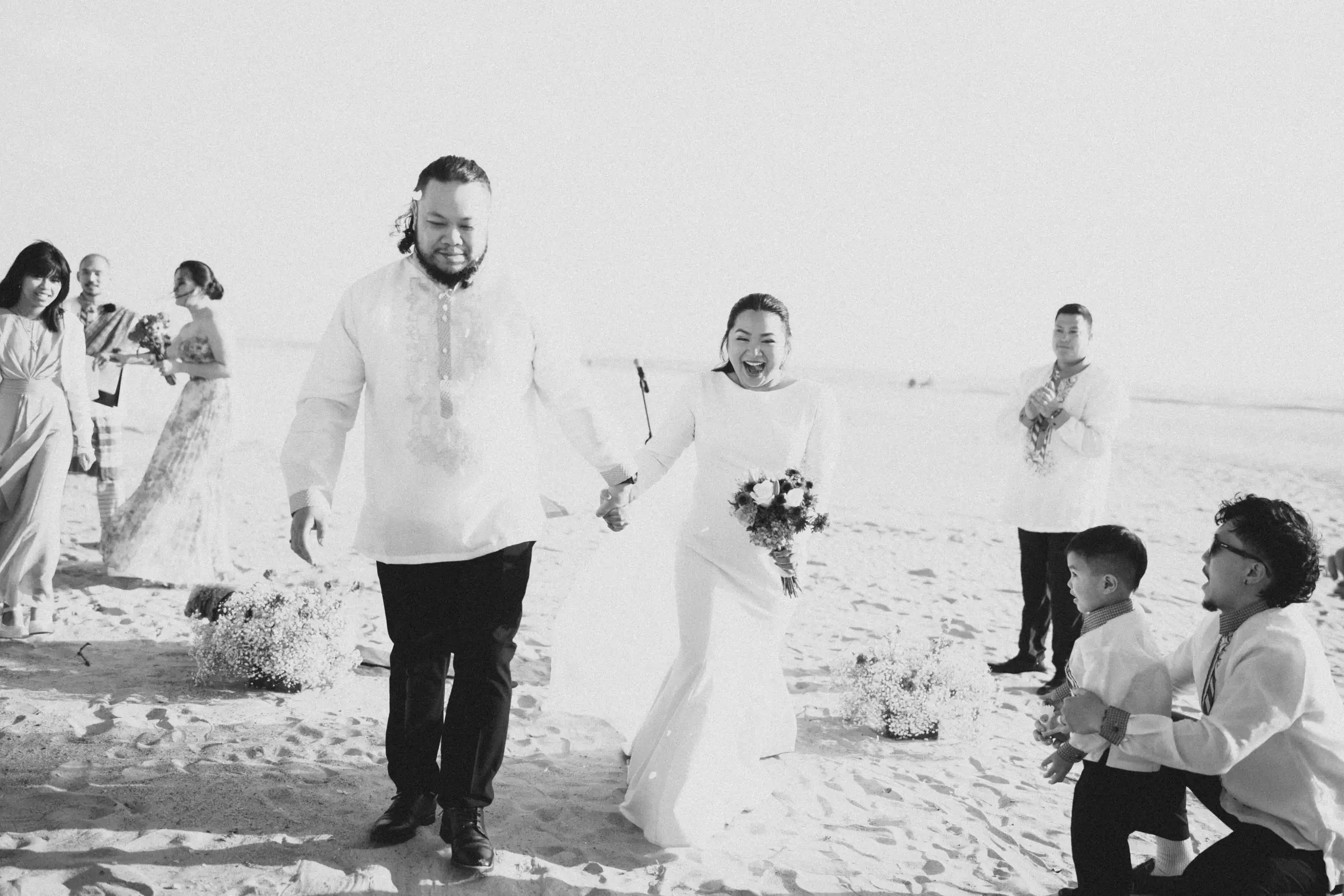 A person in white shirt and blue jeans performs a dynamic dance move against a vibrant blue background.